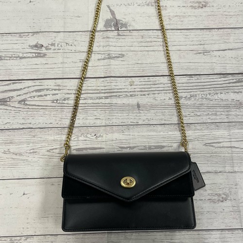 coach aster crossbody with floral frame