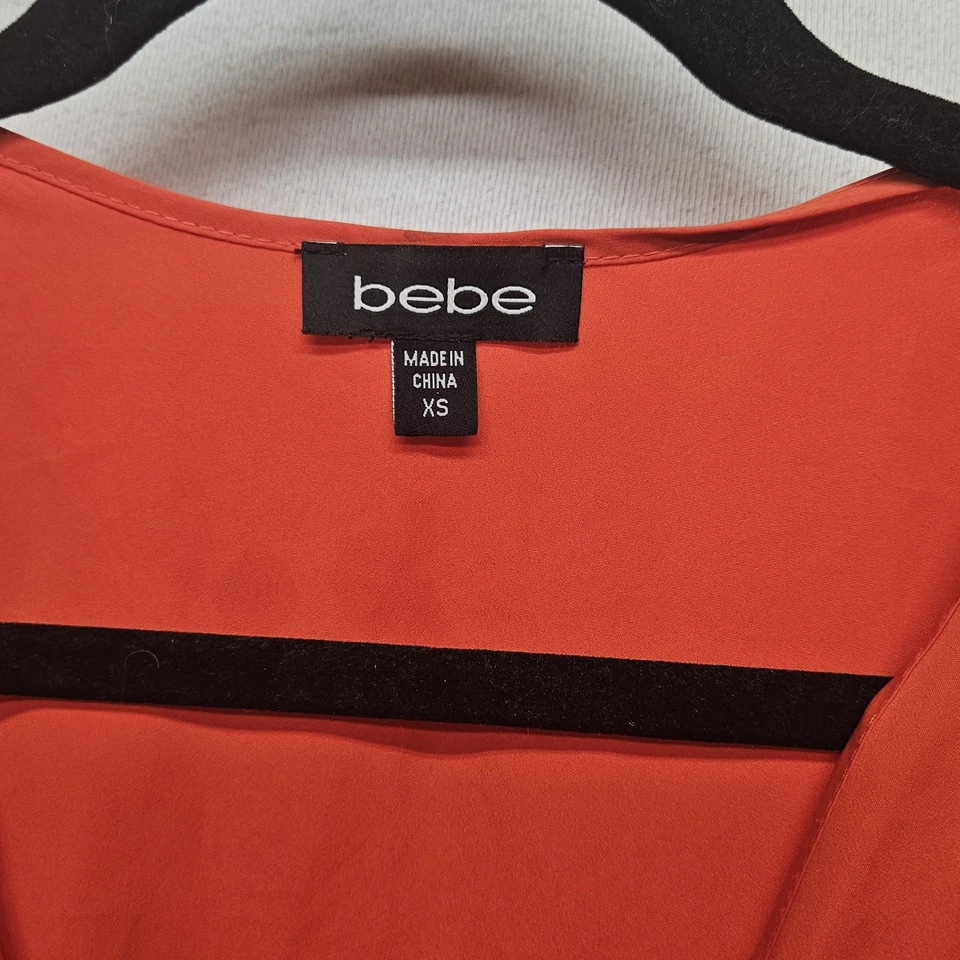 Vestido Bebe Para Mujer XS Sin Mangas Cuello en V Detalle de Botones Bolsillos Ajuste Acampanado Informal Foto 3 de 4