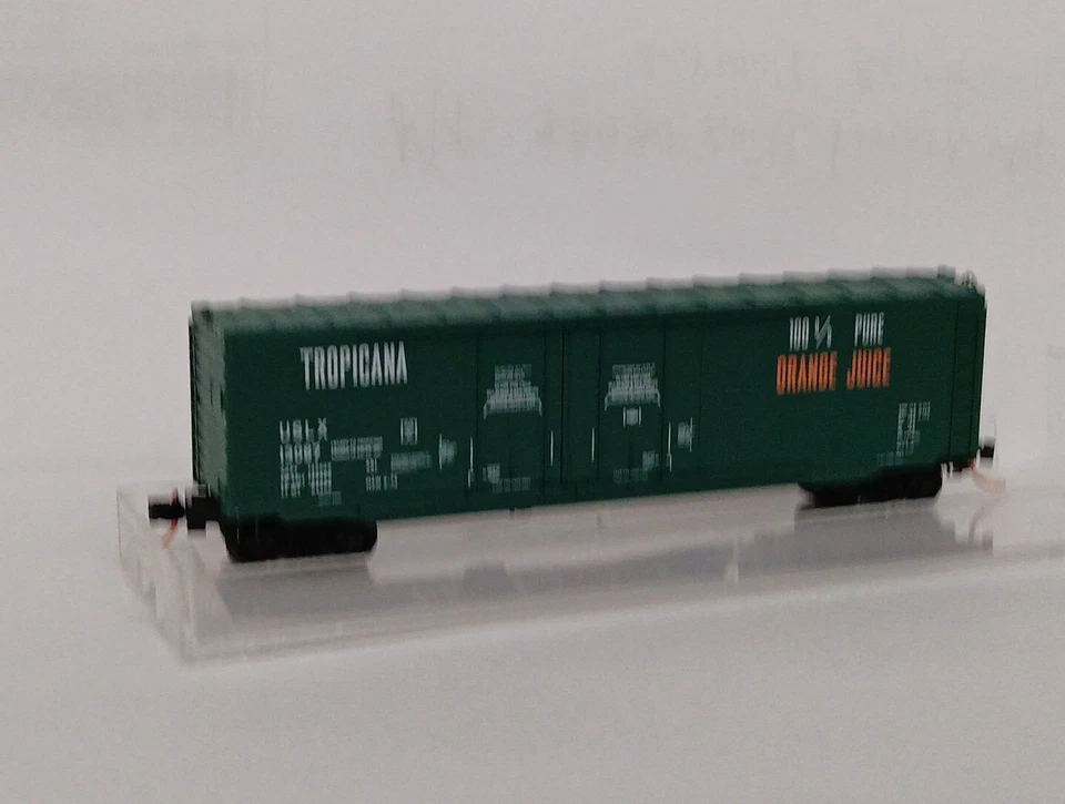 Micro-Trains #75040 Tropicana Orange Juice Boxcar escala N Foto 3 de 4