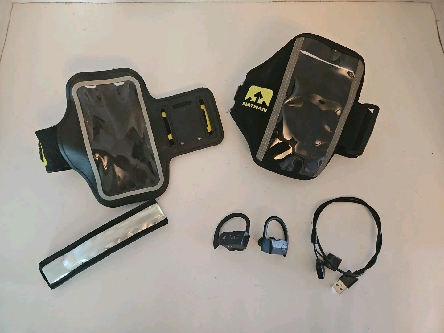 Lot Of 4 Run, Walk, Jog, Hike Gear. Ear Buds, Phone Case, Light Band