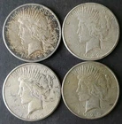 1922 D, 1922 S, 1923 S, and 1925 $1 Peace Silver Dollars