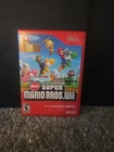 Nintendo New Super Mario Bros. Wii Nintendo Wii Multiplayer Game Case & Book