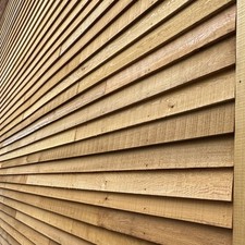 Red Western Canadian Cedar feather edge cladding boards x 47 (L+/-3.7m x W15cm)
