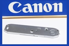 210029 CANON AE-1 PROGRAM BOTTOM COVER CHROME REPAIR PART USED AE1 PRO