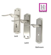 Satin Finish Stellar Door Handles On Shaped Backplate in Latch, Lock or Bathroom
