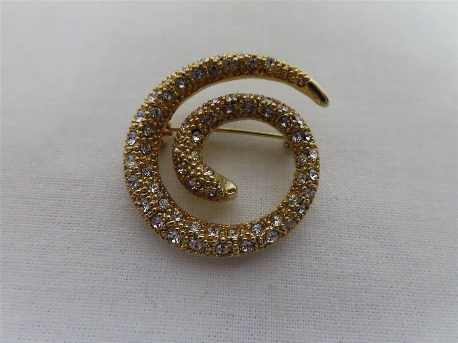 Clear Rhinestone Gold Tone Swirl Circle Pin Brooc… - image 1