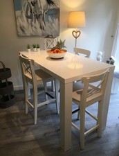 3 white IKEA INGOLF stools