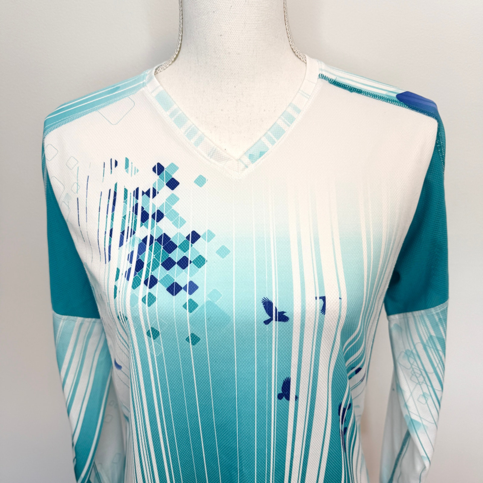 Top Salomon ActiLite Guinness sci atletico corsa strato base taglia media