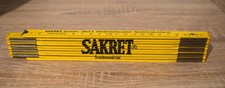 Zollstock mit Werbeaufdruck (SAKRET)