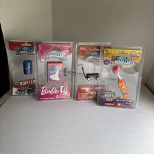 4 World s Smallest Toys Barbie Radio Flyer Yahtzee Spin Pop Nee