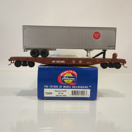 Coche plano Athearn 72456 Missouri Pacific 50’ con carga de remolque de 40’ MP | Condition: Used