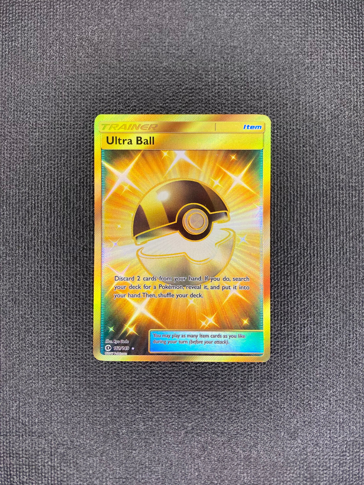 Pokemon TCG Sun & Moon Base Set Ultra Ball 161/149 Secret Rare Gold Card