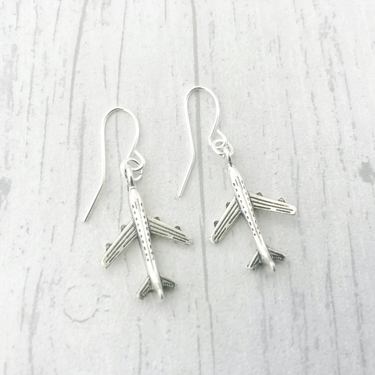 Aeroplane earrings shop