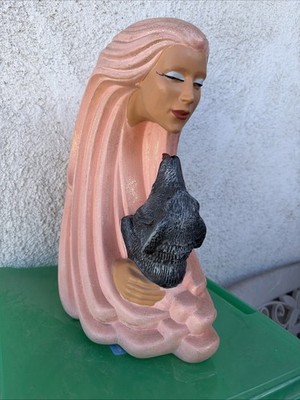 Wind Woman Sculpture With Her Dog, Trying To Give Her Some Love ￼