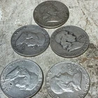 Five Franklin 1/2 dollars
