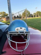 BLUE ZENITH YOUTH FOOTBALL HELMET, SIZE M, PRE-OWNED; $125