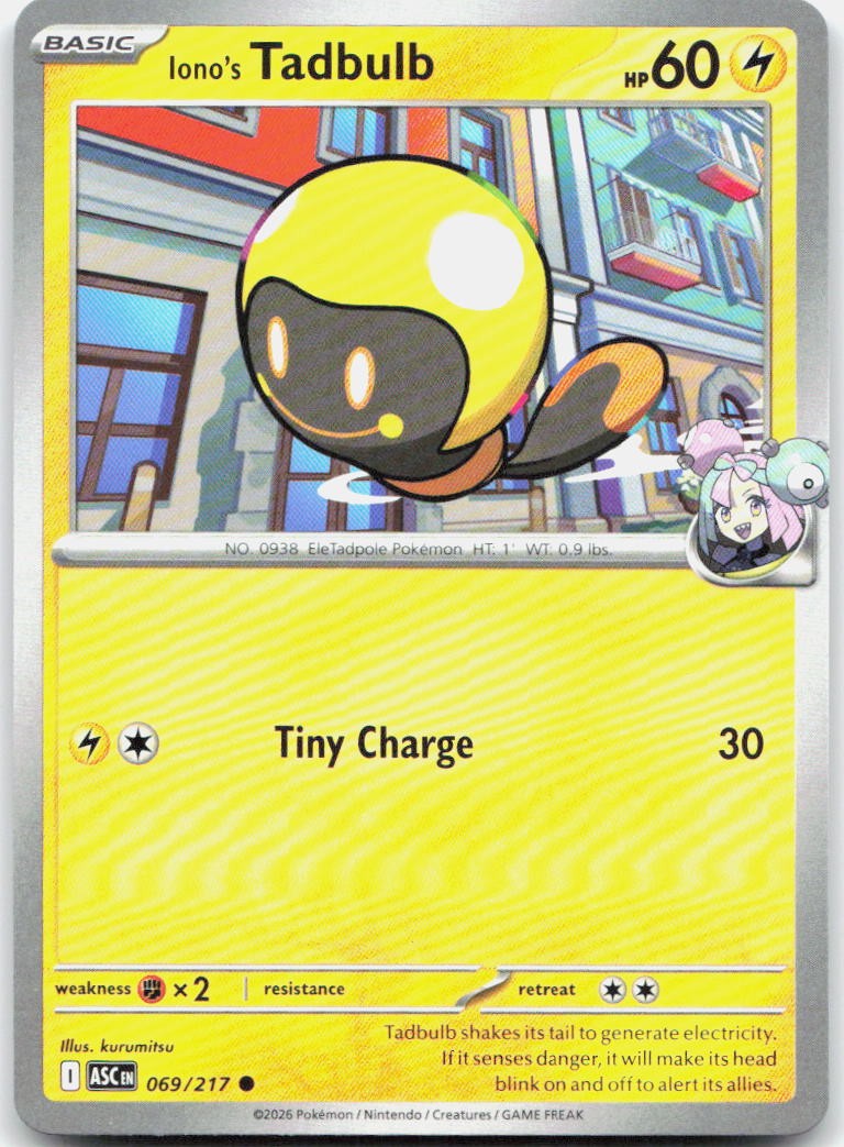 Yellow-bordered Iono’s Tadbulb card 069/217 with art of floating yellow robot and text “Tiny Charge” 30.