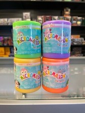 X4 MICROMALLOWS BY ORIGINAL SQUISHMALLOWS SERIES 2 - FOUR 2.5" CAPSULES IN HAND