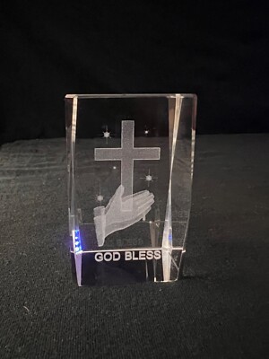 Hands around holly cross  God Bless  3D etched glass paperweight