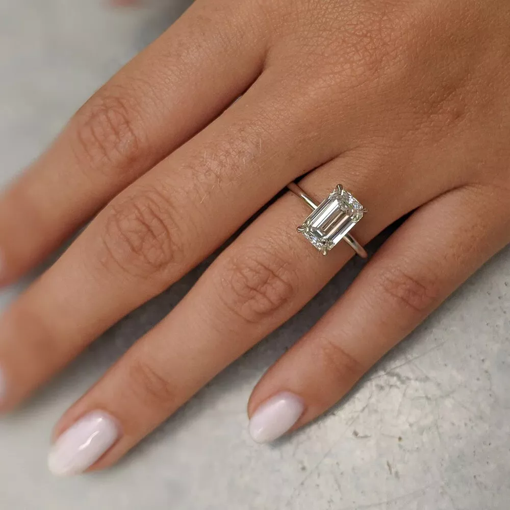 Baguette Halo Engagement Ring | Art deco emerald cut engagement ring,  Emerald engagement ring cut, Engagement rings