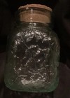 LA MEDITERRANEA EMBOSSED GREEN TINT GLASS JAR WITH CORK LID, SPAIN — photo 1