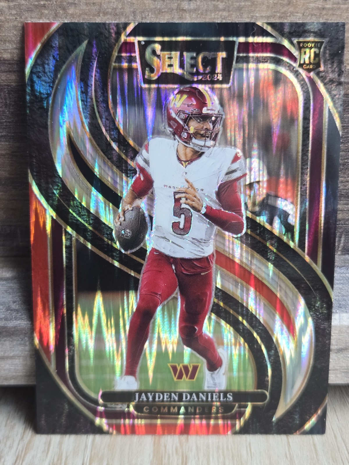 2024 Panini Select - Premier Level Jayden Daniels #112 Black/Red Shock Prizm RC