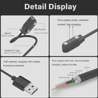 Black 60cm magnetic USB charger with copper probe, PVC skin, aluminum mesh, and visible USB interface.