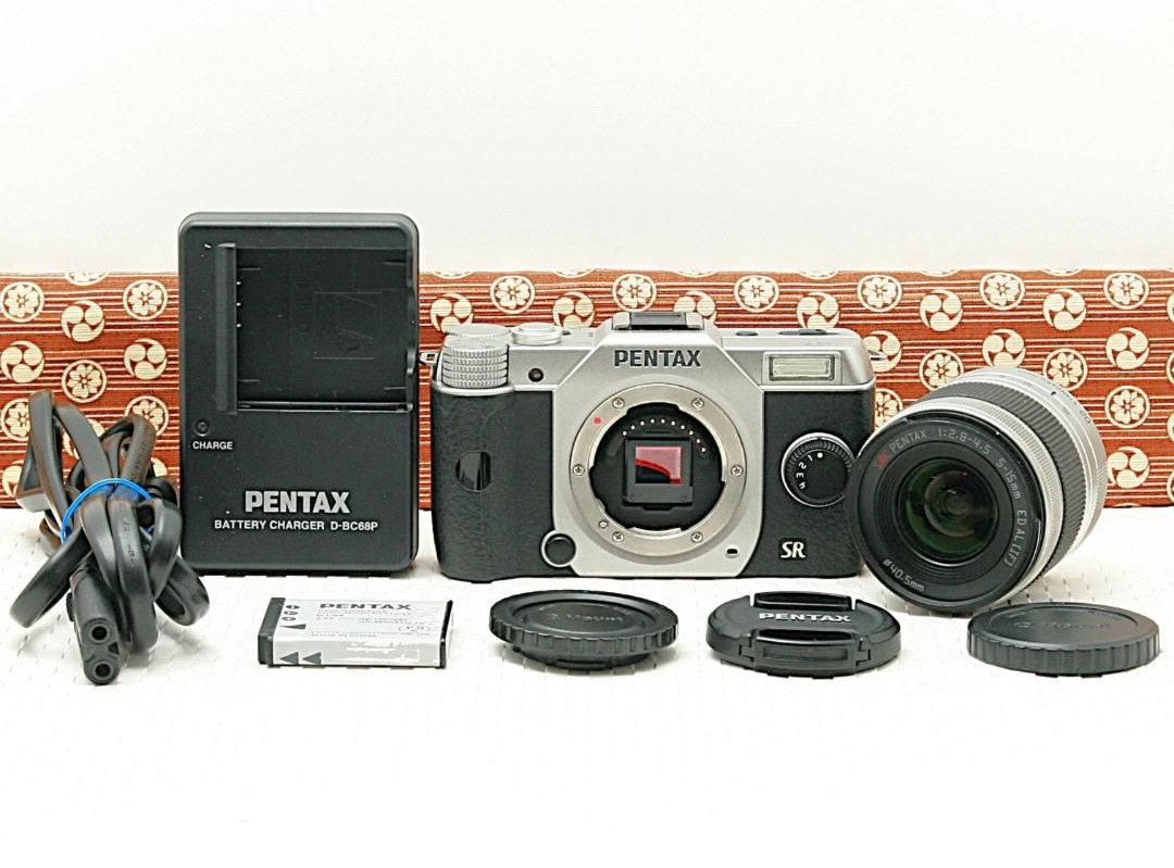 Pentax Q7 Silver 12.4MP Digital Camera w/ 5-15mm F2.8-4.5 ED Pentax Q7 Silver 12.4MP Digital Camera w/ 5-15mm F2.8-4.5 ED