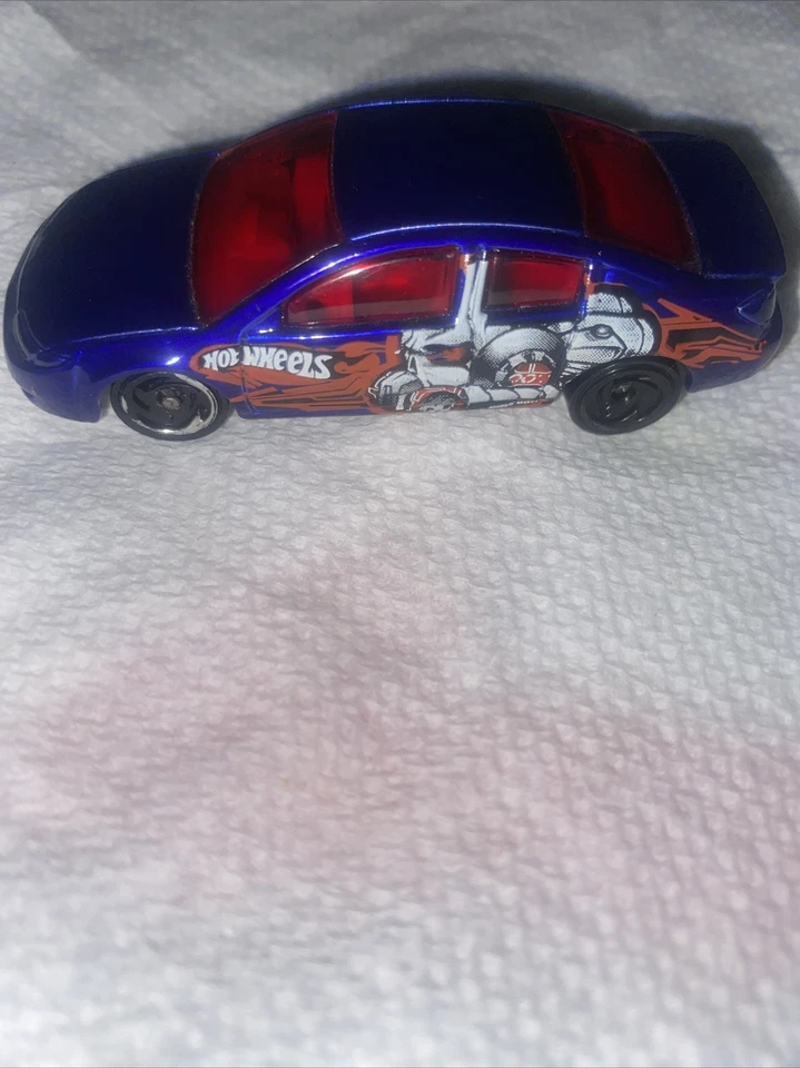 Saturn Ion Blue 2002 Hot Wheels con gráficos Foto 3 de 4