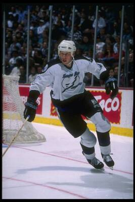 Defenseman Cory Cross Tampa Bay Lightning moves down the ice the A- Old Photo