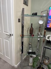 glass and chrome unit 160cm height 54cm width with 4 glass shelving
