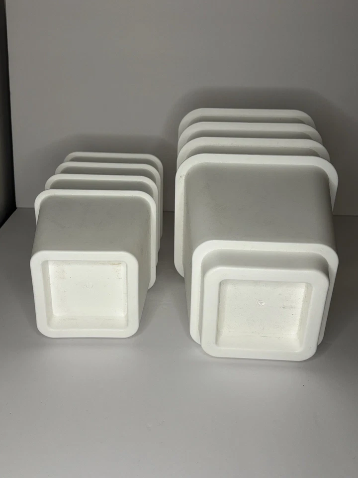 Juego de 8 elevadores de cama de plástico blanco Target para muebles de dormitorio de alta resistencia Foto 2 de 4