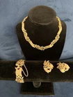 Trifari Vintage Three-Piece Jewelry Set Necklace Bracelet Earrings Gold Tone