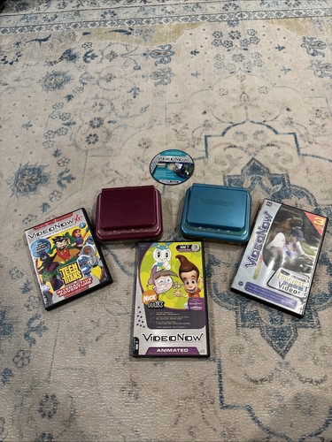 2 Video Now XP Video Players with 4 Discs UNTESTED NO POWER READ DES PINK & BLUE