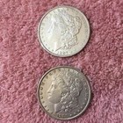 MORGAN SILVER DOLLAR COINS.  LOT OF 2  AU./DETAILS  PRE. 1921 LOT # 7