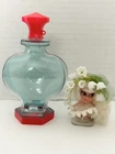 Liddle Kiddles Lily Of The Valley Kologne Plastic Bottle & Doll w/ stand Mattel