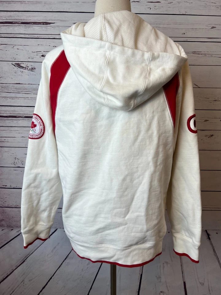Equipo Canadá Olímpico HBC Sudadera con Capucha Mujer Pequeña Olimpiada Media Cremallera Sudadera Foto 2 de 4