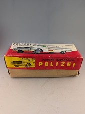 VINTAGE ICHIKO TIN FRICTION POLICE CAR WITH BOX