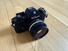 Nikon EM 35mm SLR Film Camera with 50mm f/1.8 Series E Lens