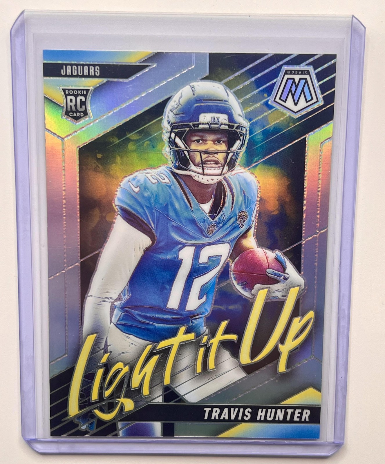 2025 Panini Mosaic Light It Up Mosaic Travis Hunter #15 Silver Prizm RC Jaguars