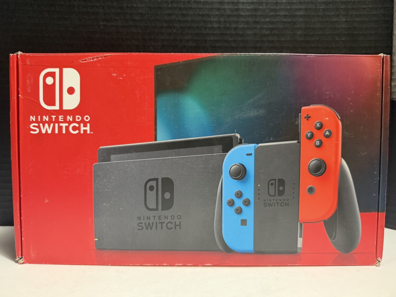 Nintendo Switch with Neon Blue and Neon Red Joy-Con 