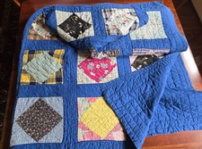 VNTG Patchwork Quilt 66" x 82" with Blue Field and Various Colorful Fabrics