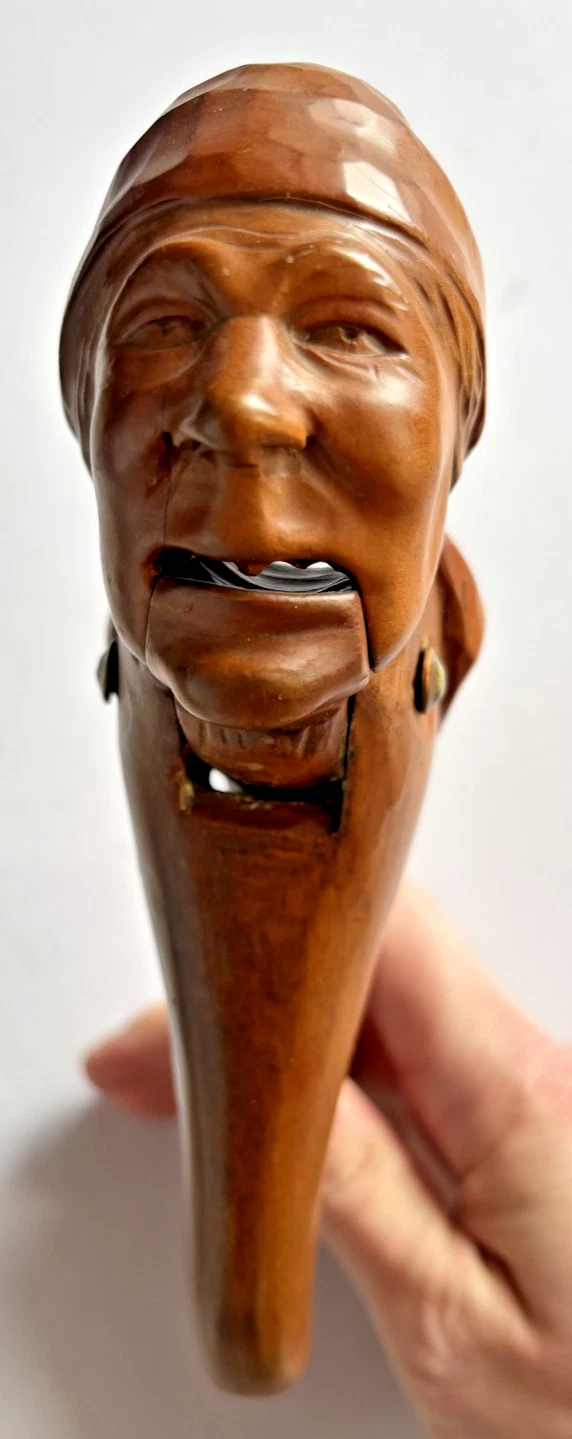 Black forest style wooden nutcracker old lady in nightcap
