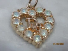 DIOR ZIP PULL   24X20MM gold tone, mint green CRYSTALS THIS IS FOR 1 heart