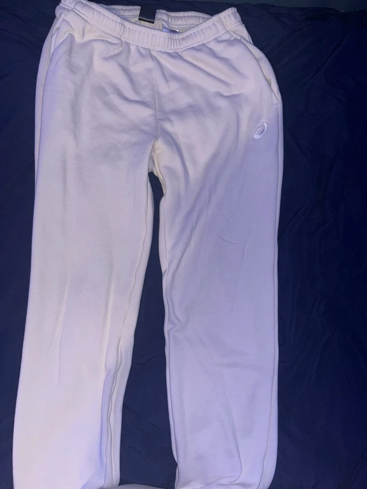 Pantalones de chándal Asics crema Foto 3 de 4