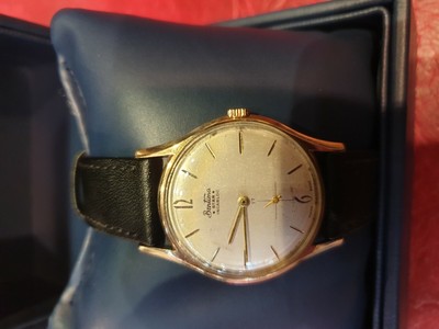 Vintage 9ct gold Bentima Watch on black 