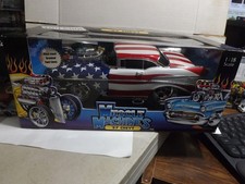 Muscle Machines '57 Chevy Stars Strips 1/18 Scale