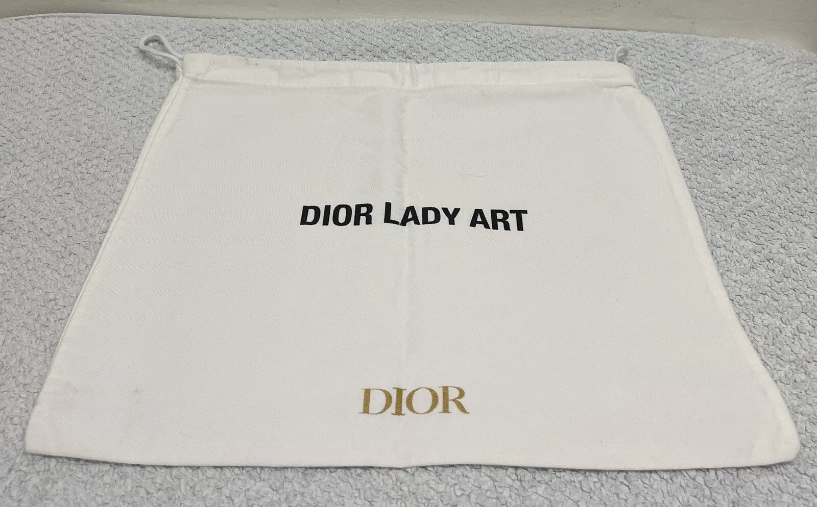 Vêtement / sac à poussière Dior