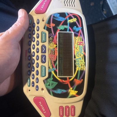 Name That Tune Electronic Hand-Held Game 1997 Tiger Electronics