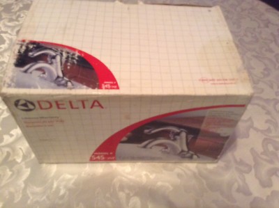 Delta faucet East Street Model 545 WF Polish Chrome 4'' Centerset 1 handle pop-up